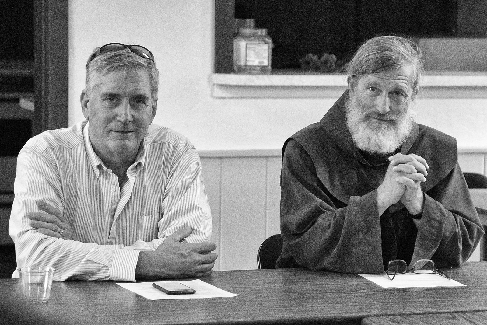 Chuck Dunn, Executive Director, at a community meeting in 2009 with David Buer omf